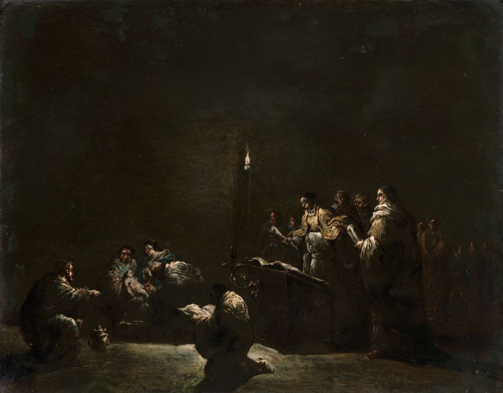 A dark scene of men performing a medical procedure.
